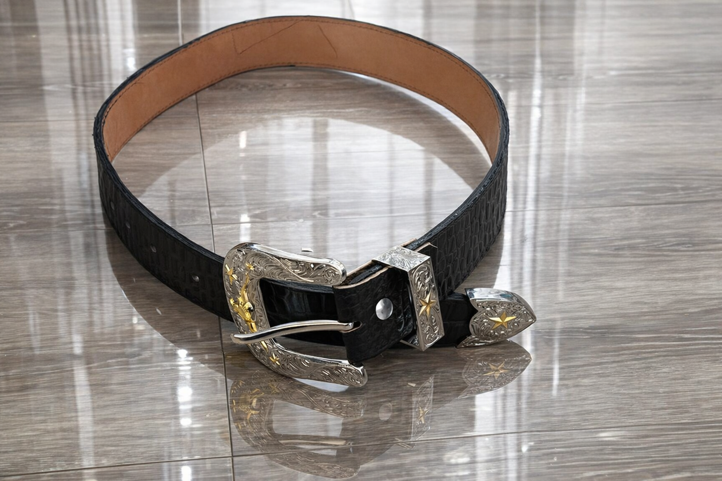 Western-style leather belt with a lone star