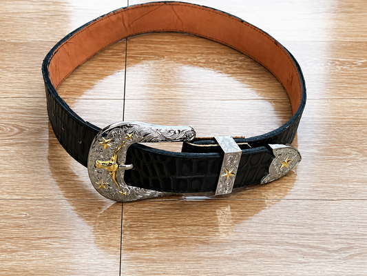 Western-style leather belt with a lone star